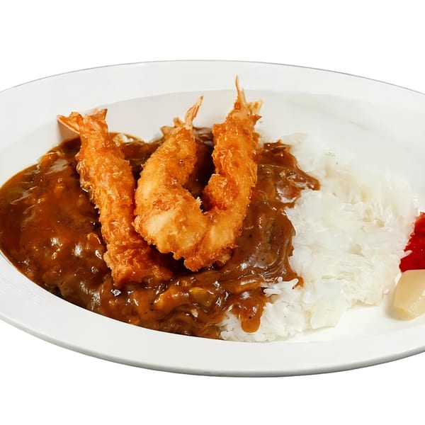 Nippon Curry's Japanese curry with three crispy fried shrimp, white rice, and pickled ginger.