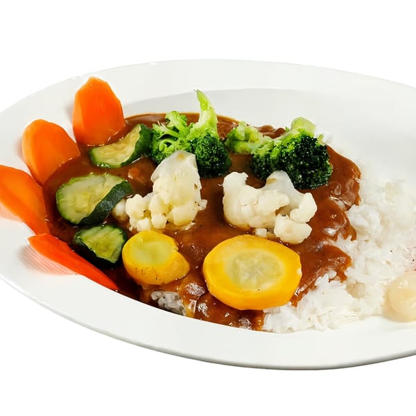Nippon Curry's Japanese curry with rice, carrots, zucchini, broccoli, cauliflower, and yellow squash.