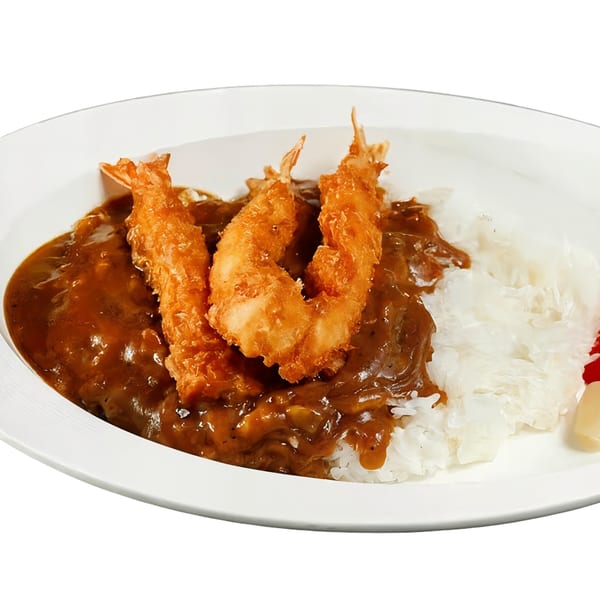Nippon Curry's Japanese curry with three crispy fried shrimp tempura and white rice.