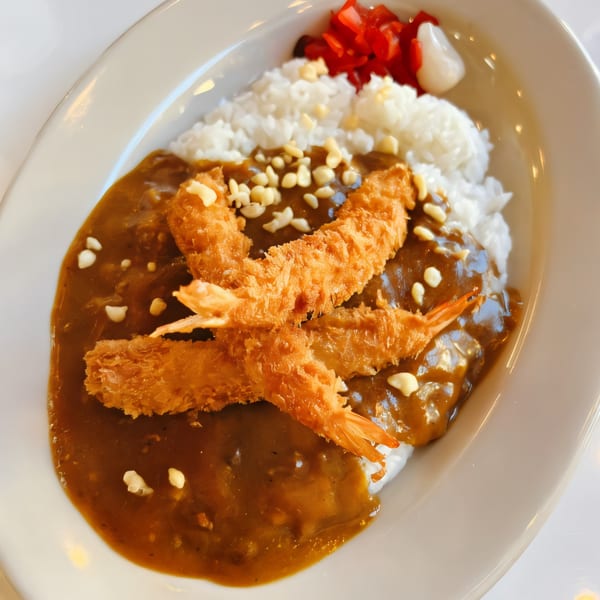 Nippon Curry's Japanese curry with crispy fried shrimp, white rice, and pickled ginger.